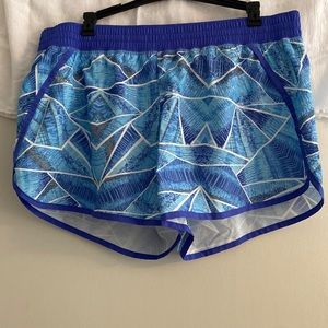 Blue shorts, C9 champion. Size XL.